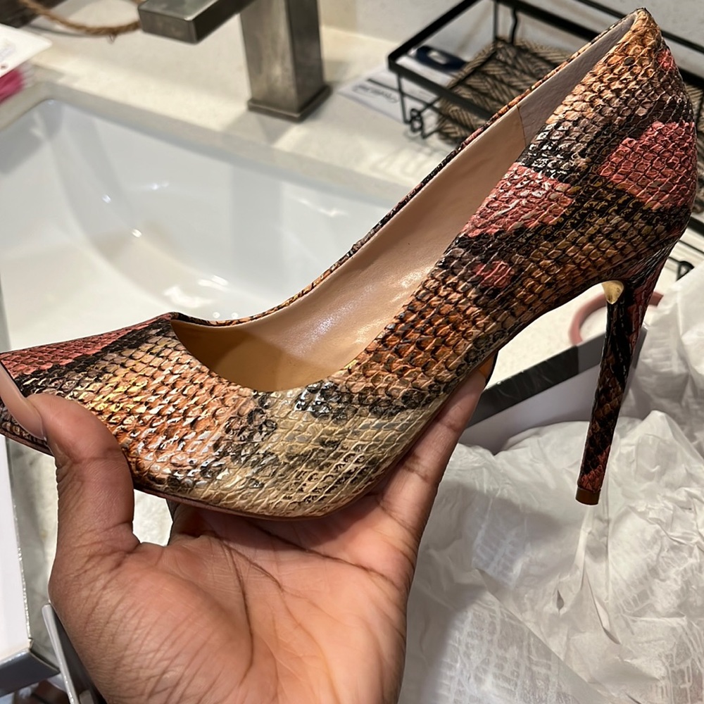 Worn only once. Still has box and tissue